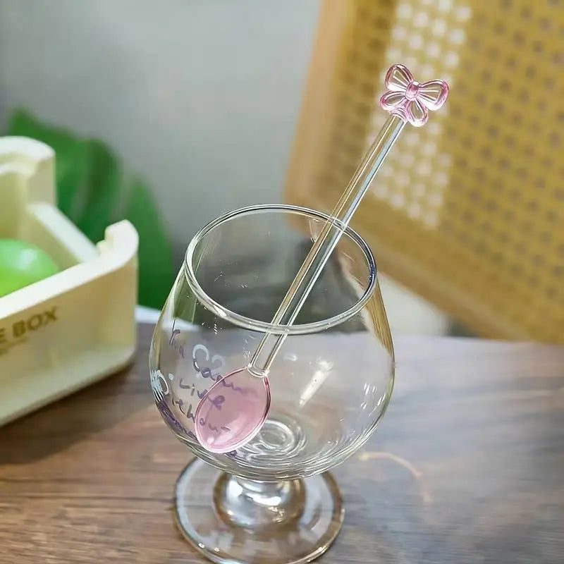 Glass tea spoon bow