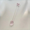 Glass tea spoon bow